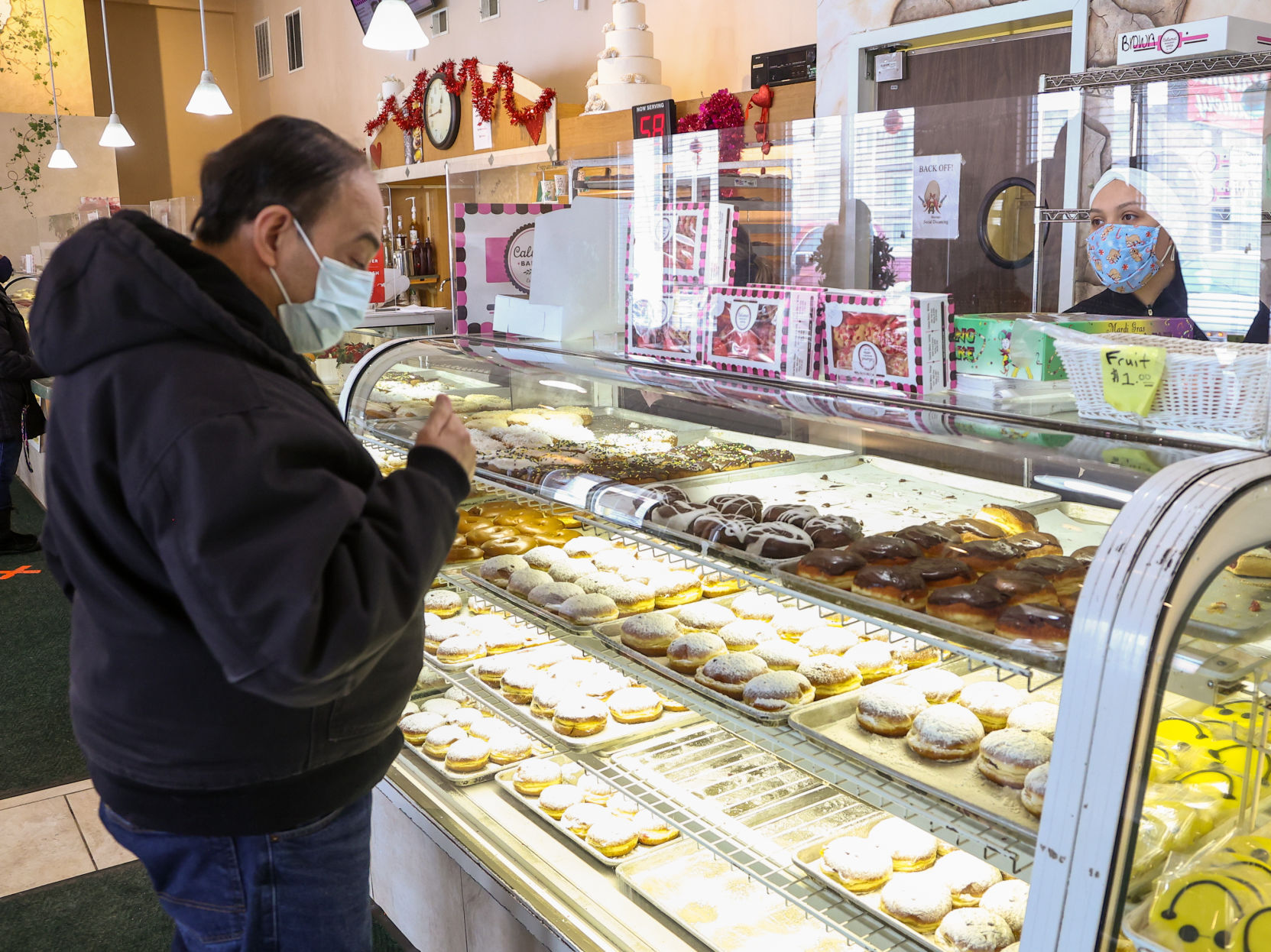 Preparing for Paczki Tuesday at Calumet Bakery
